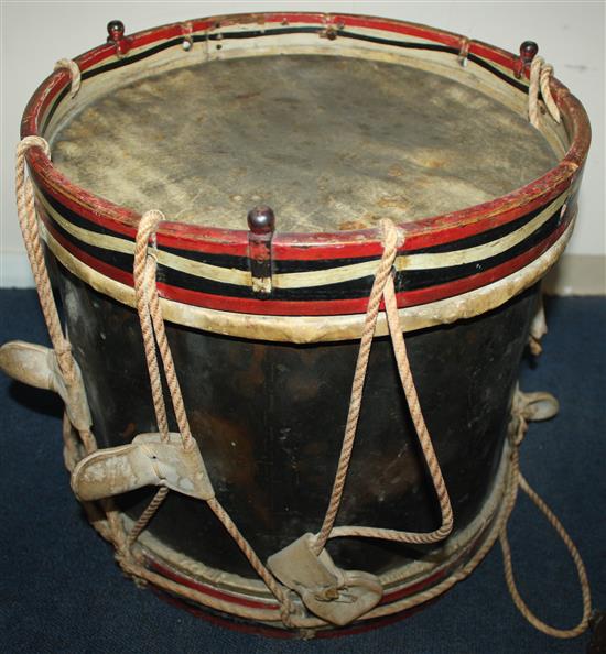 An early 20th century military brass drum for the Gloucestershire Regiment, 14.5in.